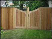 Concave cedar gate.